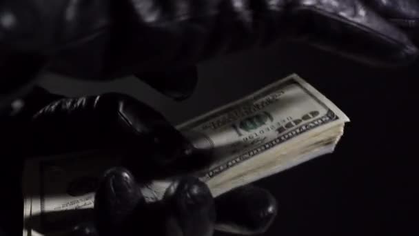 Černé rukavice kontrolující dolary — Stock video