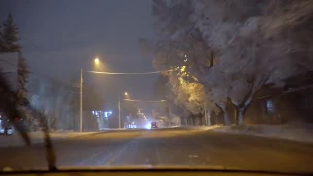 Winter city from a car window — Stock Video