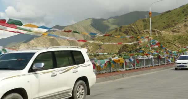 China-Aug 12,2016:4k prayer flag on lhasa river bridge,tibet. — Stock Video