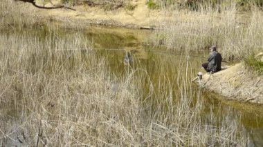 Çin-wilderness.elderly,le sallayarak Nis 22, Rüzgar, lake.river sazlık tarafından Balık tutma 2017:Fisherman