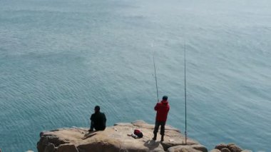 Çin-Eyl 12, 2016:Man üzerinde resif balık tutma.