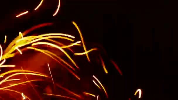 Schöne brillante Flamme, Fliegenschnur, Teilchen. — Stockvideo