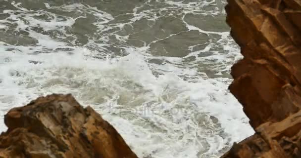 4k sparkling ocean sea water waves surface&coastal rock reef coast surge shore. — Stock Video