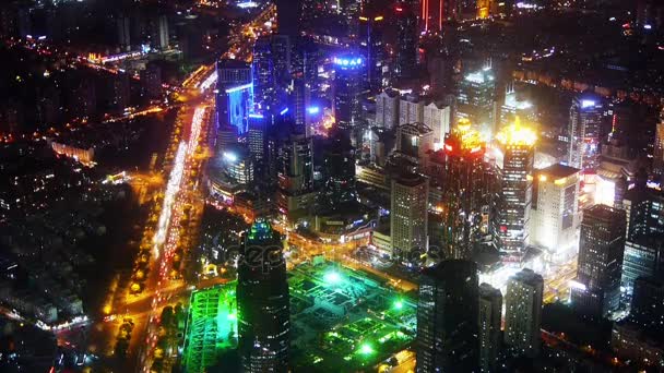 Flygfoto över höghus & stadstrafik på natten, Kina, timelapse. — Stockvideo