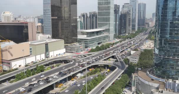 China-Sep 09,2017: 4k, tráfego pesado através do distrito de negócios central de BeiJing, edifício urbano . — Vídeo de Stock