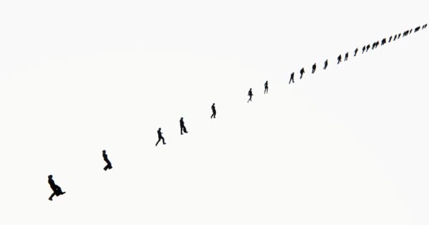 4k Crowd Of People walking turned into a row,businessman silhouette. — Stock Video