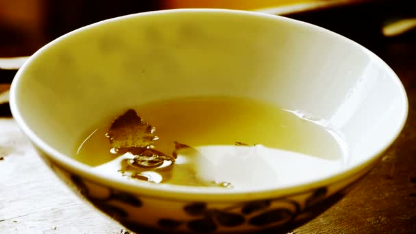 Teapot pouring tea,ancient customs of leisure.china,japan,water,steaming. — Stock Video