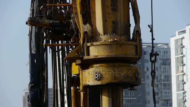 Drilling machinery,Construction of city buildings. — Stock Video