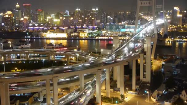 Timelapse busy urban traffic on shanghai overpass bridge at night,china. — Stock Video