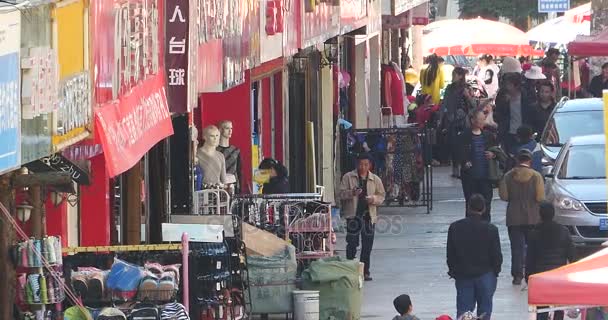 China-Sep 08.2016: 4k die geschäftige Menschenmenge auf dem Markt in shangri-la Straße, China. — Stockvideo