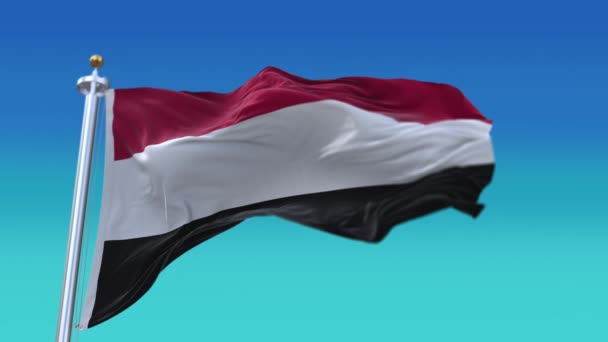 4k Jemen Nemzeti zászló lassú ráncok zökkenőmentes hullámzó szél az égen háttér. — Stock videók