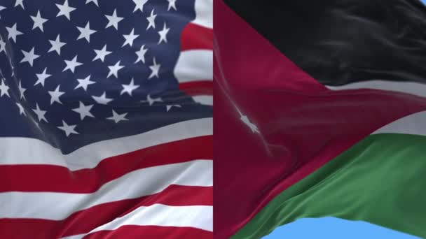 바람을 배경으로 미국 4K 미국 과 요르단의 국기. — 비디오