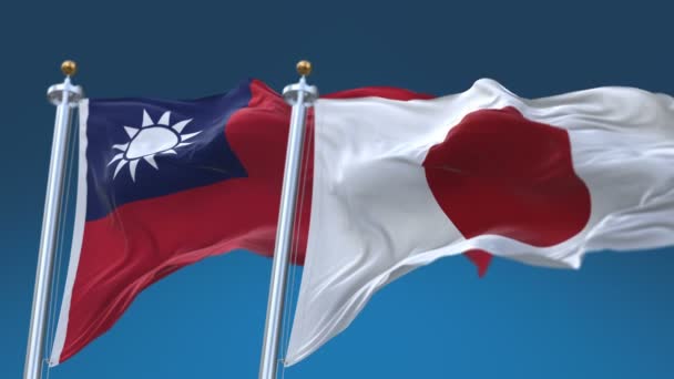 4k naadloze Taiwan en Japan vlaggen met blauwe hemel achtergrond, TWN JP. — Stockvideo