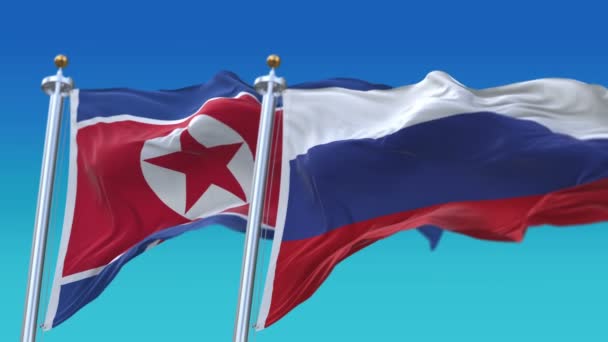 4k varrat nélküli Észak-Korea és Oroszország zászlók kék eget háttér, PRK KP RUS ru — Stock videók