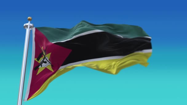 4k Mozambique National flag wrinkles waving wind sky seamless loop background. — Stock Video