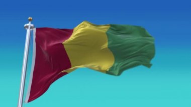 4k Gine Ulusal Bayrak Kırışıklıkları Rüzgâr gökyüzünde pürüzsüz bir döngü.