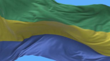 4k Gabon Ulusal bayrağı dalgalanan rüzgârlı gökyüzü pürüzsüz döngü arka planı.