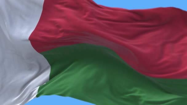 4k Madagascar drapeau national rides ondulant vent ciel boucle sans couture fond .