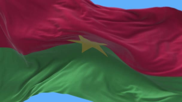 4k Burkina Faso Nemzeti zászló ráncok hullámzó szél ég zökkenőmentes hurok háttér — Stock videók