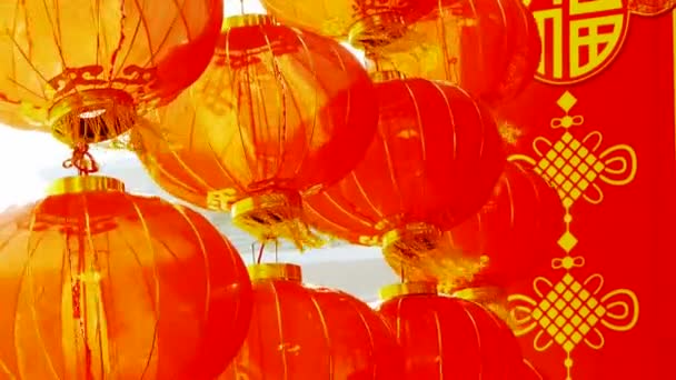 風に揺れる赤い提灯のタッセル、東、中国の新年の要素. — ストック動画