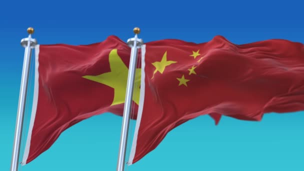 4k naadloze Vietnam en China vlaggen met blauwe hemel achtergrond, Vie VN CHN CN. — Stockvideo