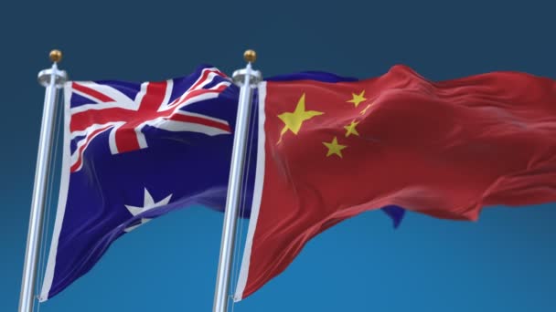 4K bezszwowe Australia i Chiny flagi z niebieskim tle nieba, aus au CHN CN. — Wideo stockowe