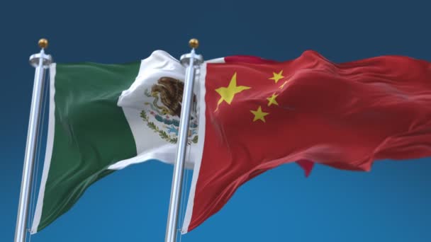4k Płynne flagi Meksyku i Chin z niebieskim tle nieba, MEX MX CHN CN. — Wideo stockowe