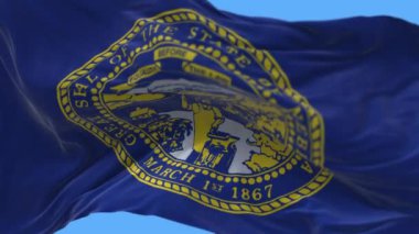 4k Nebraska bayrağı, Amerika Birleşik Devletleri devleti, kumaş dokusu döngüsü arka planı.