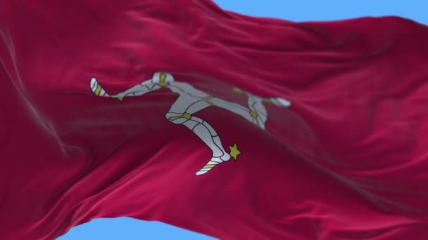 4k Isle of Man National flagga rynkor sömlös viftande vind himmel bakgrund. — Stockvideo