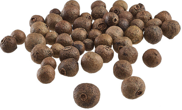 all spice scattered on the table with peas, whole
