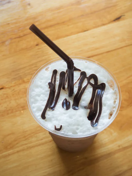 Coffee caramel frappe with whipped cream in a coffee shop — Stock Photo, Image