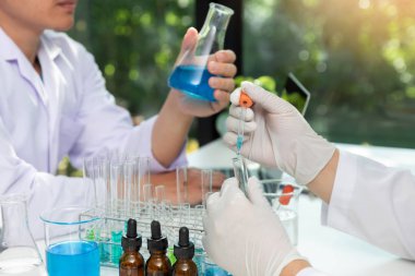Research and development concept, Laboratory scientist working at lab with test tubes about medicine