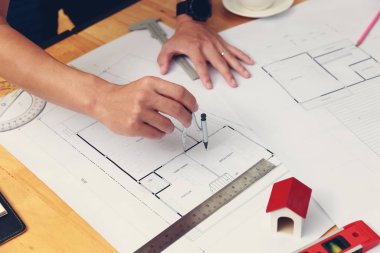 Mühendis ve Mimar konsepti, Mühendis Mimarlar ve İç mimar ofis takımı planlarla çalışıyor