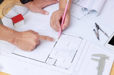 Mühendis ve Mimar konsepti, Mühendis Mimarlar ve İç mimar ofis takımı planlarla çalışıyor