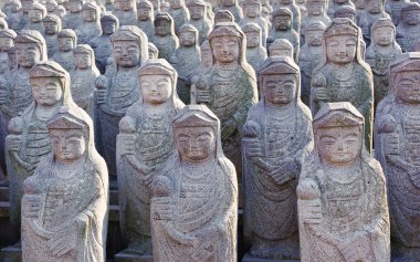 1000 arahan statues at  Gwaneumsa buddhist Temple  clipart