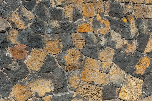 Traditional wall of volcanic stones — Stock Photo, Image