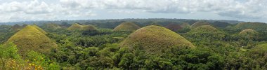 Panorama of famous landmark chocolate hills in Bohol island Phil clipart