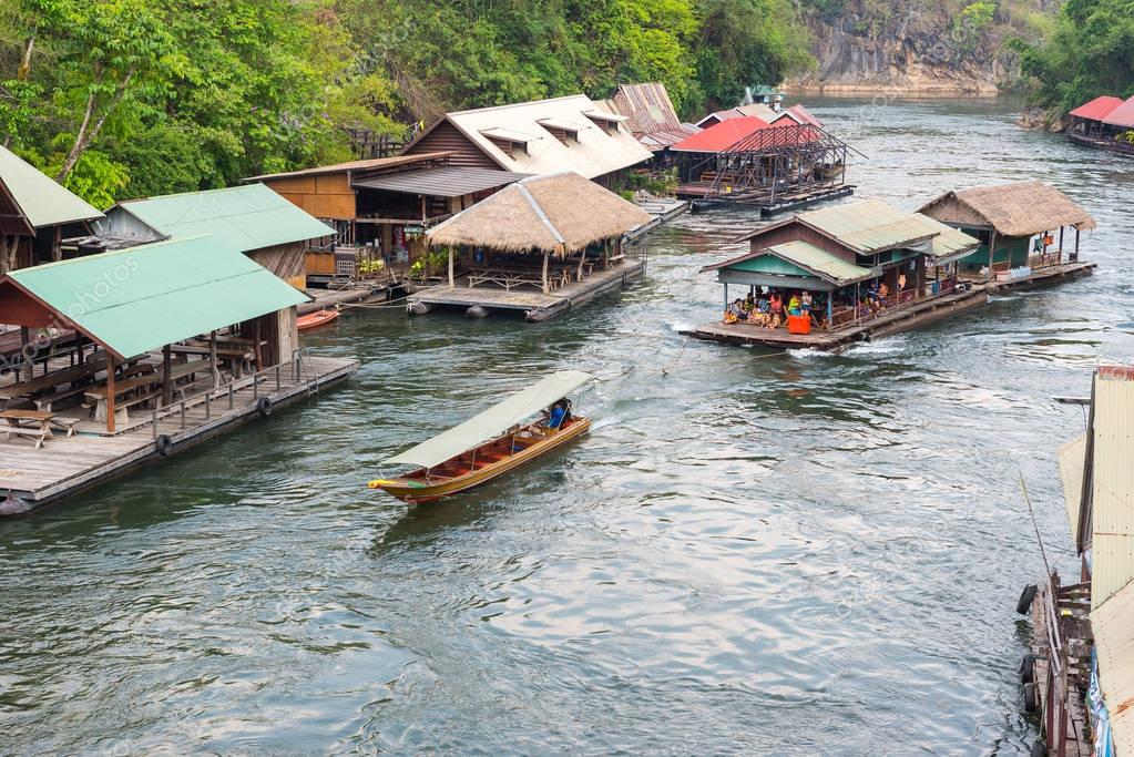 Tourism on the floating house rafting at the river Kwai, Kanchan