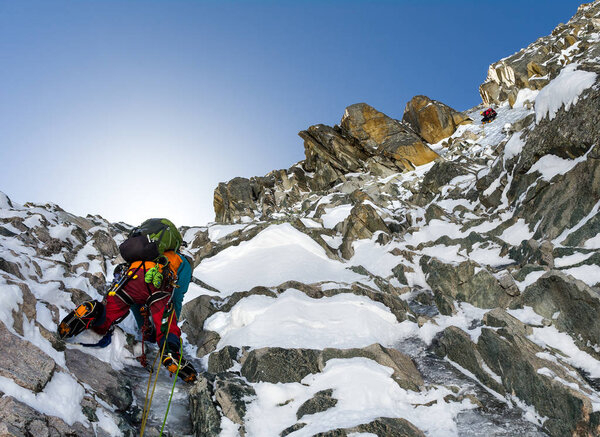 climbers at the mountain summit in scenic Tian Shan range in Kyr