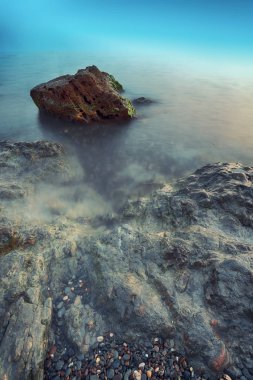 Gün batımında deniz manzarası