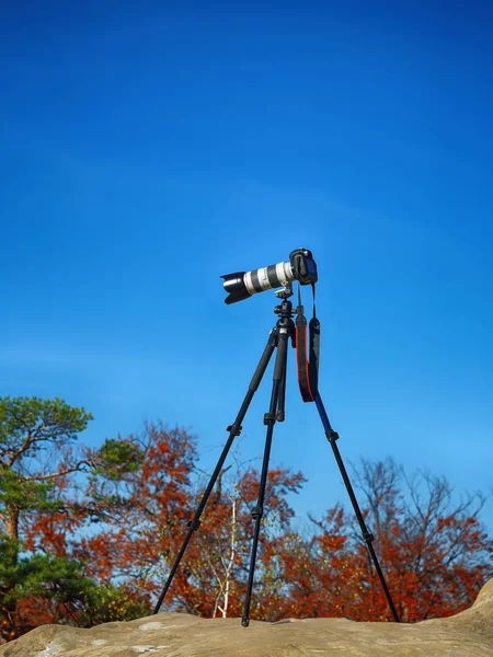 Professional digital camera on top mountain — Stock Photo, Image