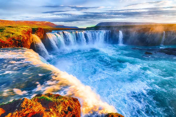 Fantastic sunrise scene of powerful Godafoss waterfall. — Stock Photo, Image