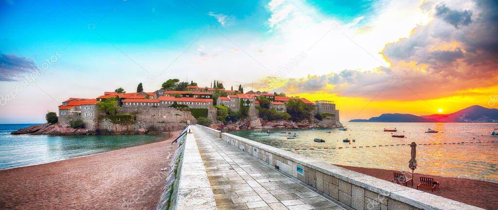 Fantastic sunset view of luxury beach and islet Sveti Stefan near Budva. Location:  Budva riviera, Montenegro, Balkans, Adriatic sea, Europe