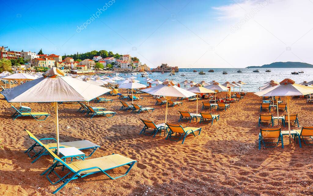 Picturesque summer view of Adriatic sea coast in Budva Riviera near Przno village. Cozy beach and buildings on the rock. Location: Przno village, Montenegro, Balkans, Europe