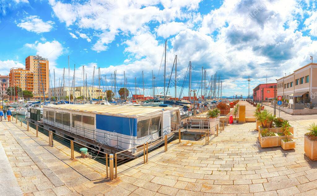 Splendid spring Cityscape with marina and Yachts and boats in town Cagliari. Location: Cagliari, Sardinia, Italy, Europe