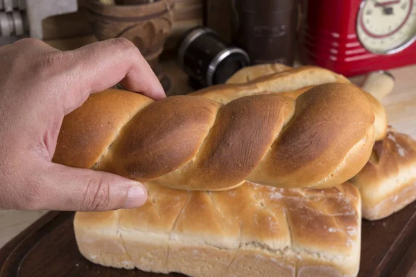 Man's Hand Holding Bread — Stock Photo, Image