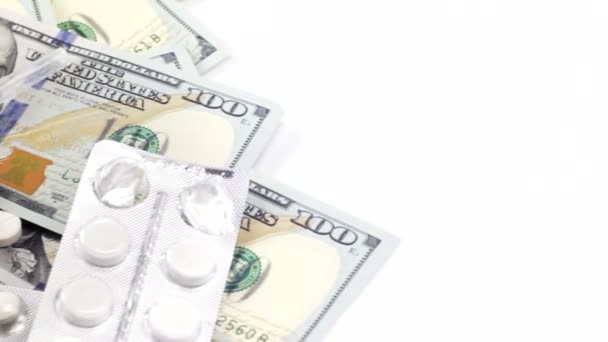 The movement of dollars and drugs on white background — Stock Video