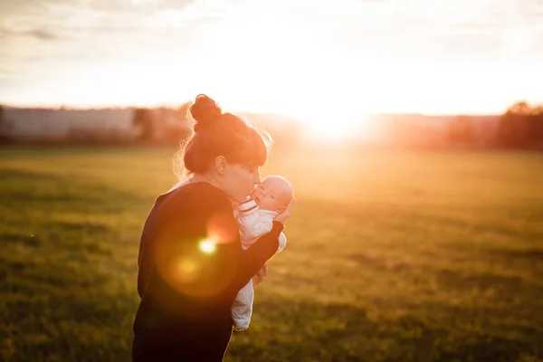 Beautiful young woman with her adorable little son — Stock Photo, Image