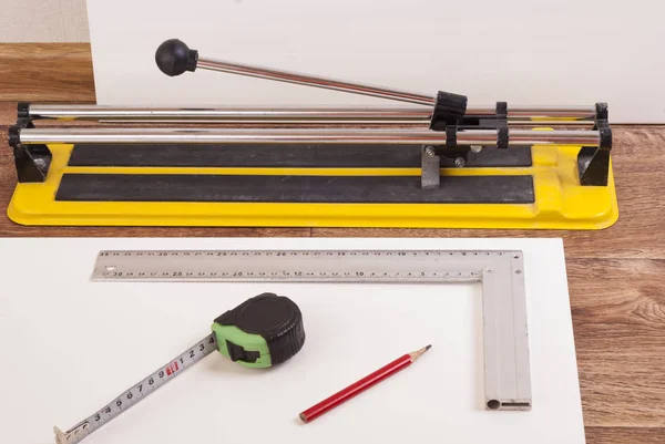 Tile cutter on the floor — Stock Photo, Image