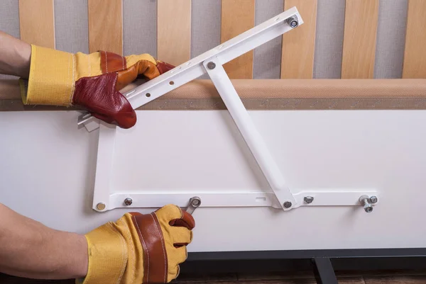 Assembling bed furniture — Stock Photo, Image